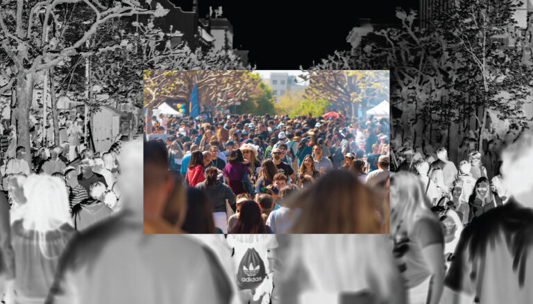 A photo illustration showing students streaming down a campus walkway. The outer frame is in black and white negative; the central frame is in full color.