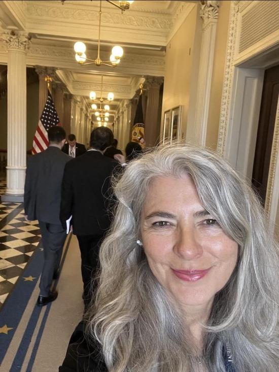 selfie of a woman in the white house