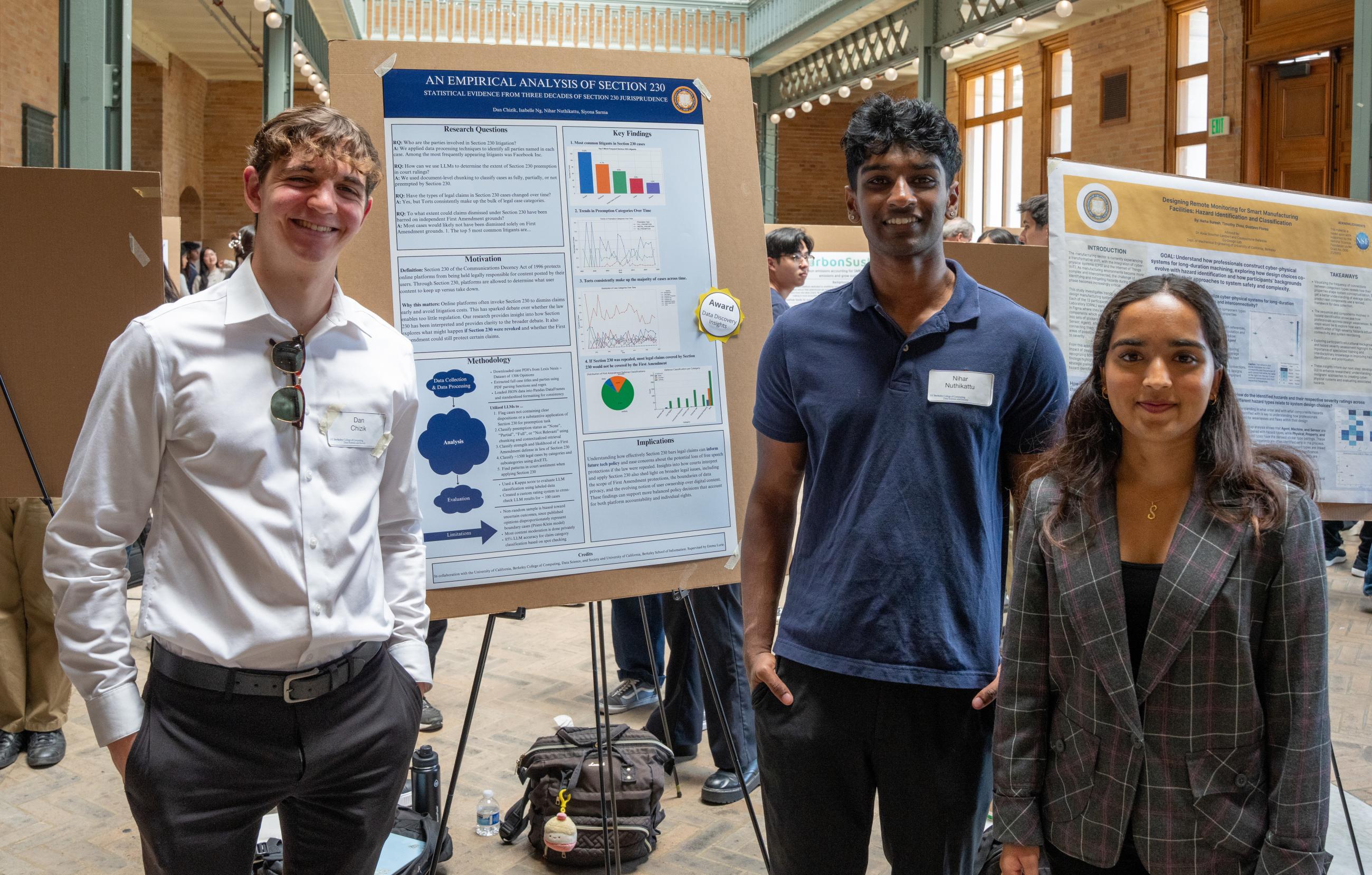 Students showing research at a poster session