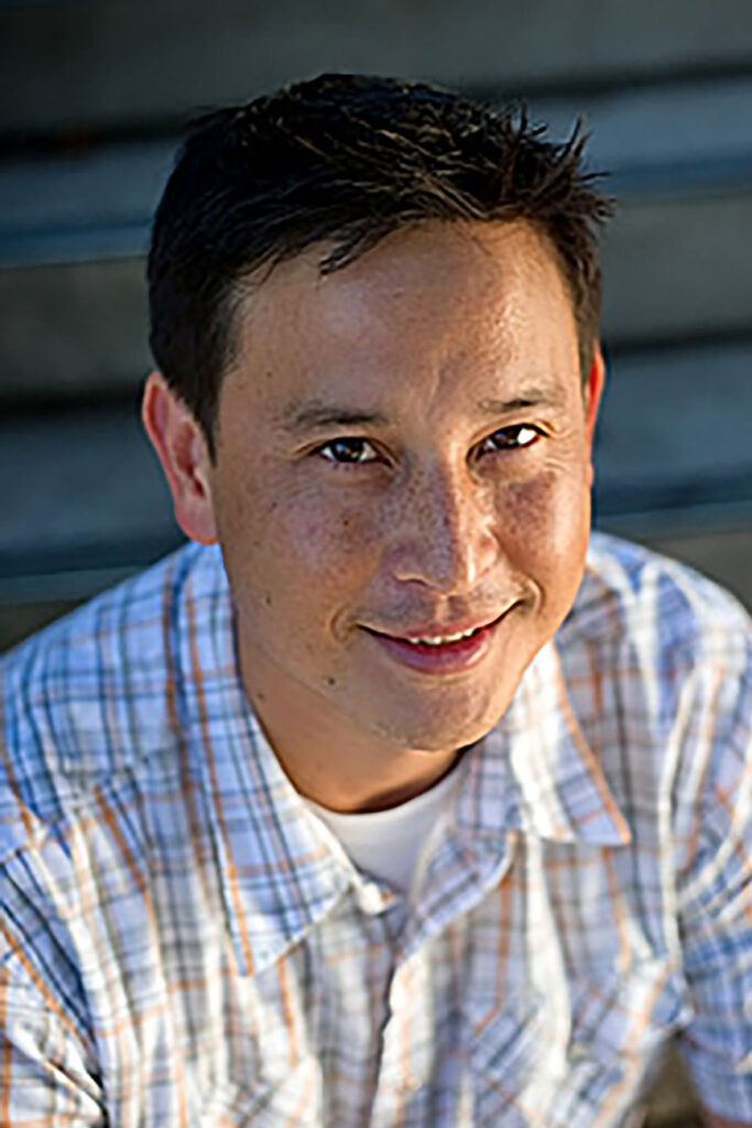 headshot of man looking up