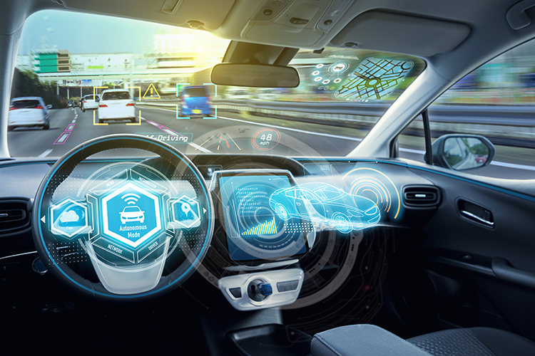 Holographic images are superimposed over an illustration of a car dashboard.