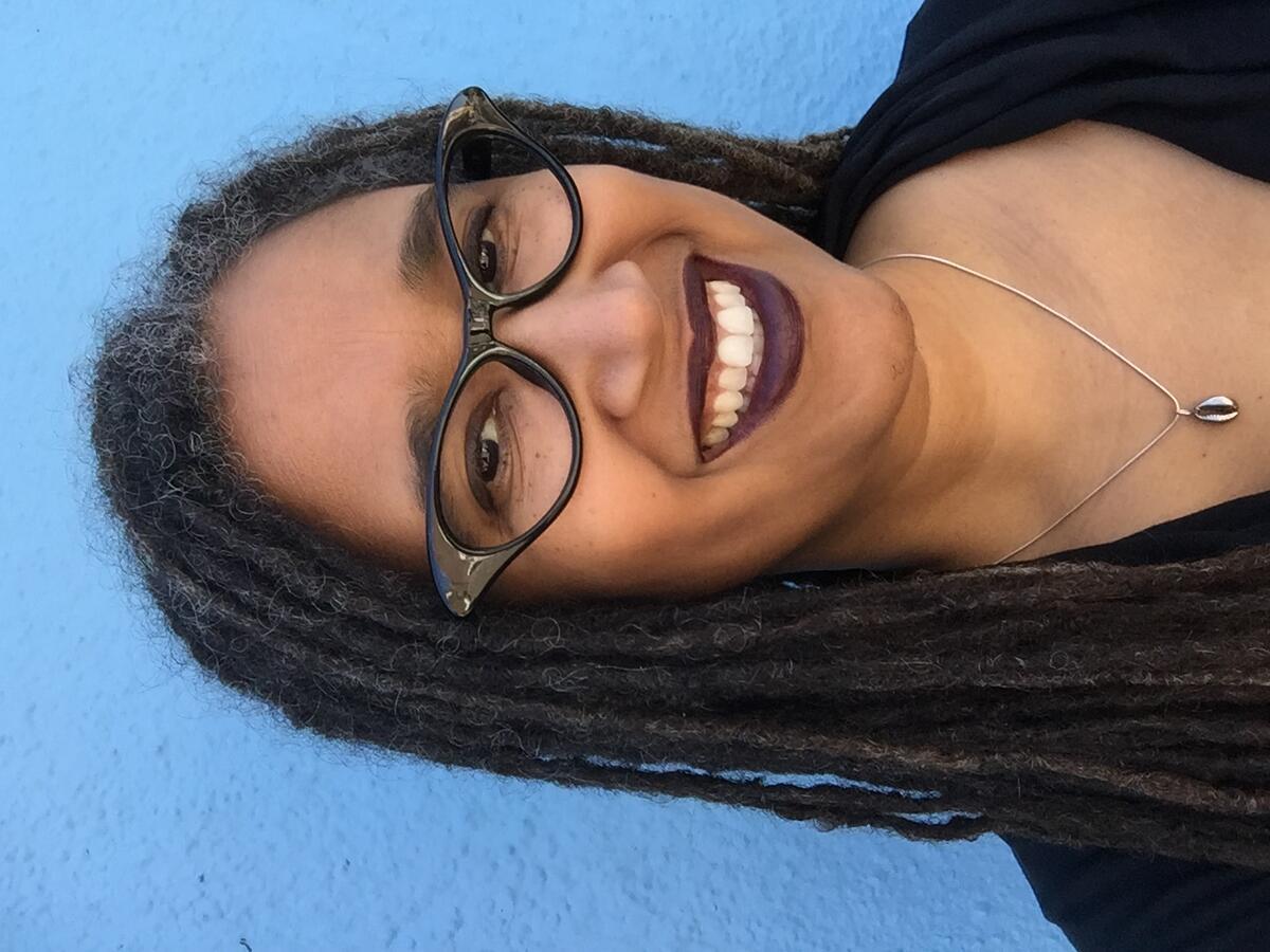 headshot of woman smiling