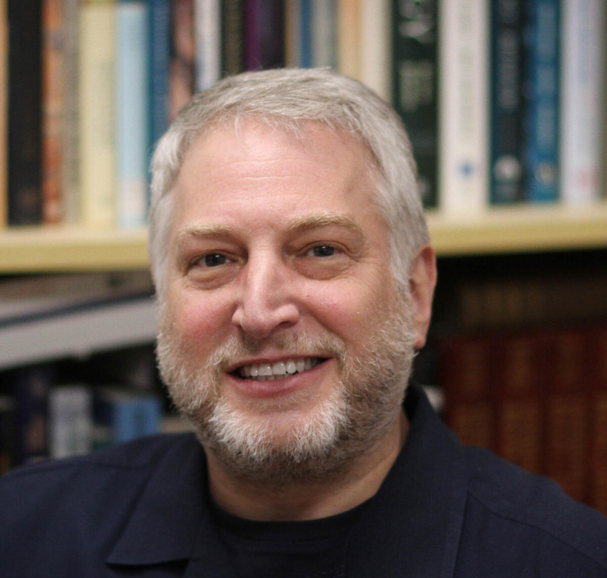 headshot of man smiling