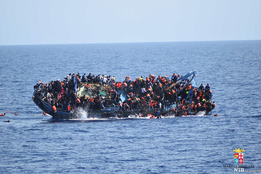 migrant boat capsizes