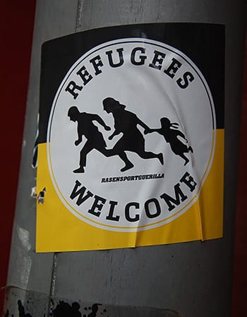refugees sign