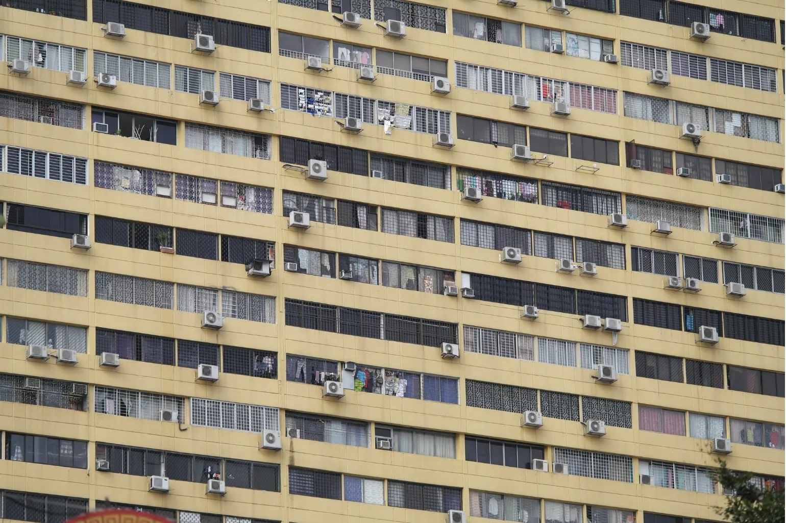 image of residential building in Singapore with air conditioning units