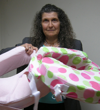 Arlene Blum with two nursing pillows.