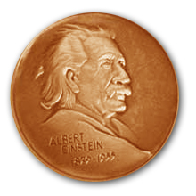 A copper medal with Einstein's face and text that reads:'Albert Einstein, 1879 to 1955'.