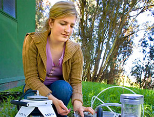 A student conducts an experiment.