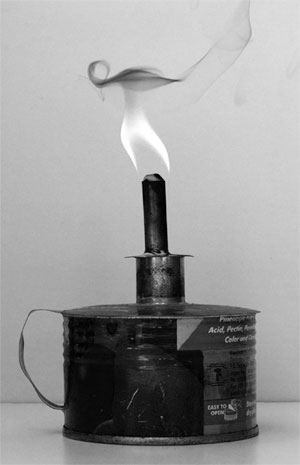 Smoke emitted by simple wick lamps