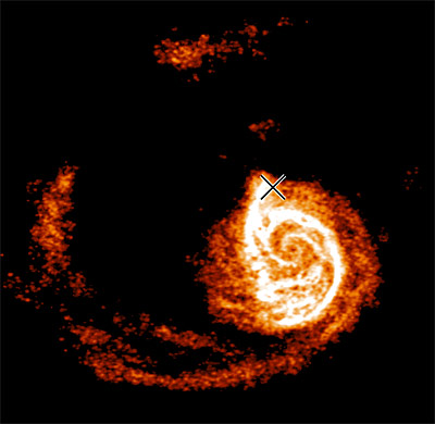 An orange spiral galaxy.