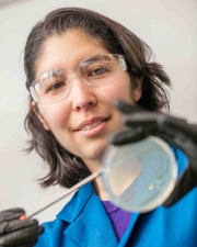 Professor Michi Taga with Petri plate