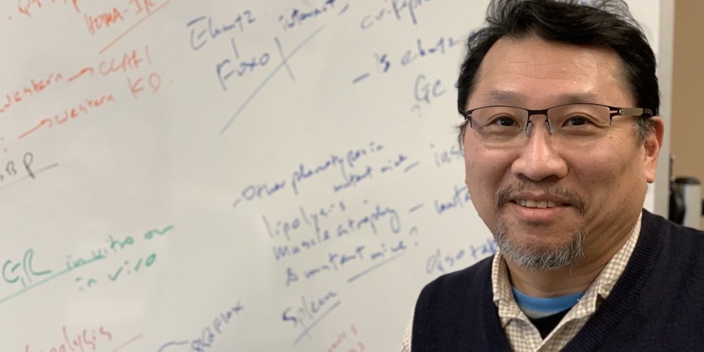 Wally Wang standing in front of a white board