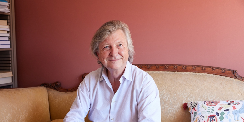 Niklaus Largier sitting in office