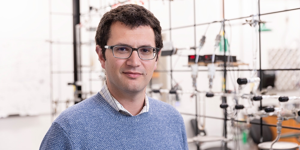 Daniel Stolper in lab setting