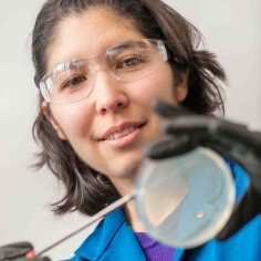 Professor Michi Taga with Petri plate