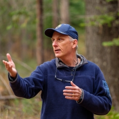 John Battles pointing out changes in forest composition during a field trip at Blodgett Forest Research Station. 