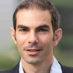 headshot of Joseph S. Shapiro