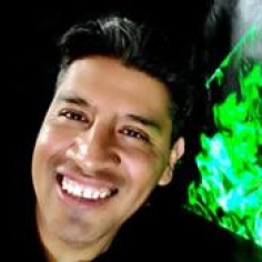 Victor Ortega Jiménez with computer projection in background