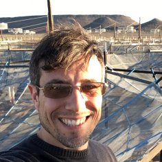 Aaron Parsons in front of the Hydrogen Epoch of Reionization Array in South Africa