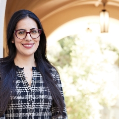 Karina Gutiérrez standing in outdoor environment
