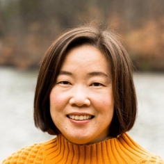headshot of Yumi Kim