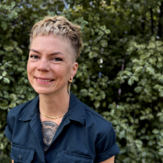 An image of Dr. Lofgren standing outdoors