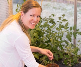 Britt Koskella in the greenhouse
