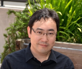 headshot of Yasunori Nomura in outside setting