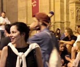 Susan Maslan in crowded interior space