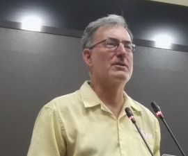 Keith Johnson at lectern