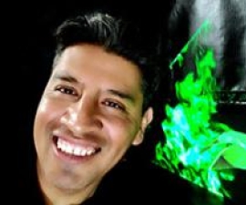 Victor Ortega Jiménez with computer projection in background