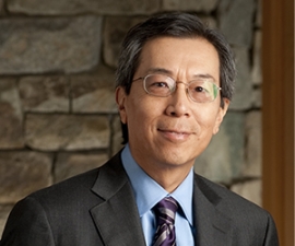 headshot of Robert Tijian wearing a suit