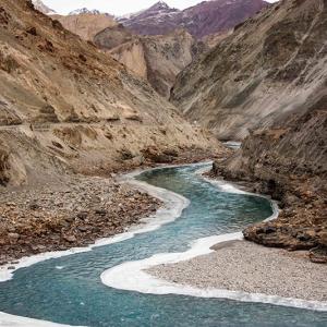 rivulet of water flowing through canyon