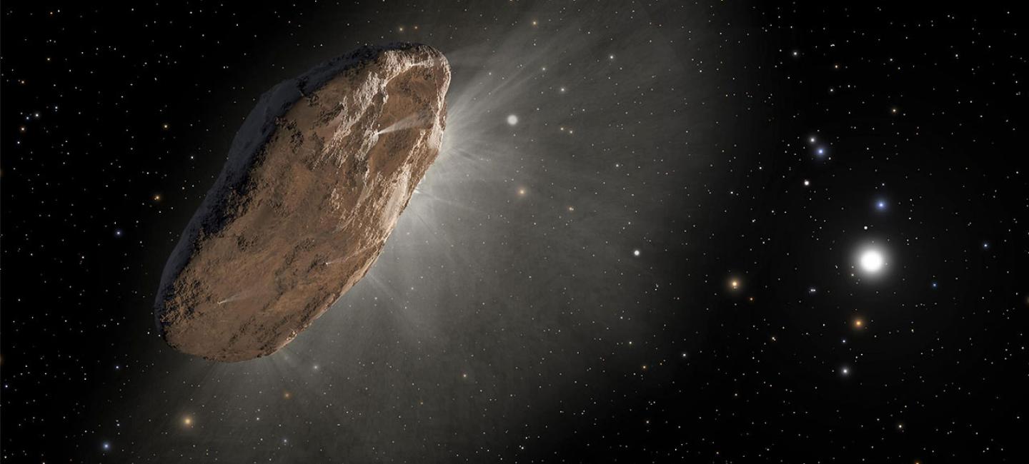 a flattened rock surrounded by mist, with sun on right