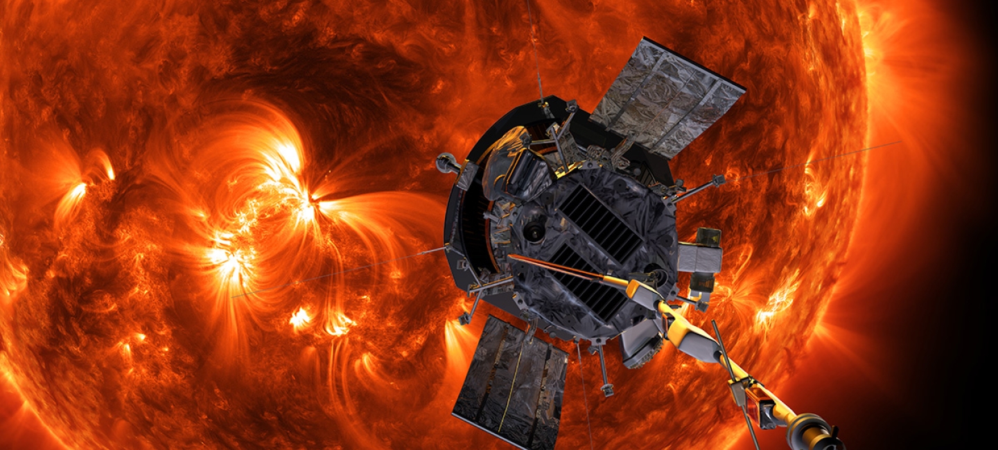 a satellite hovering over an angry red sun