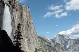 A photo of half-dome and a waterfall in Yosemite National Park