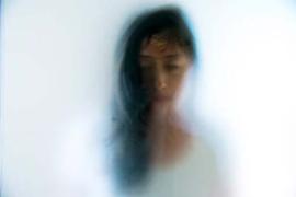 Picture of a Woman with her features blurred
