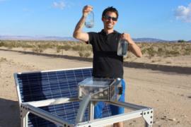 Mathieu Prévot displays water collected by the harvester
