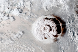 ash clouds over volcano as seen from space