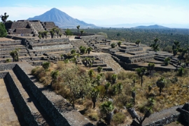 Ruins of the city of Cantona in the Mexican state of Puebla, with the mountain Pico de Orizaba in the background. The city was abandoned almost 1,000 years ago, probably as a result of a prolonged dry spell.