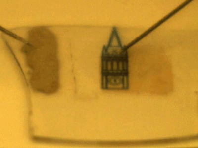 Image of demo of bright-light emitting device covered by the campanile