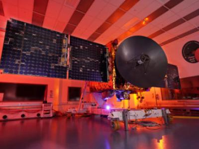 red-lit photo of probe in a testing bay