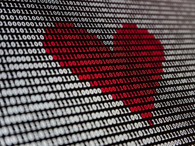 image of a heart over binary code