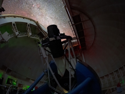The roof of the Dark Energy Spectroscopic Instrument opens up to reveal a starry night sky.