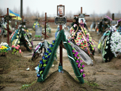 Decorations mark the graves of men and women in Bucha, Ukraine, who were killed by invading Russian troops after the invasion in February 2022