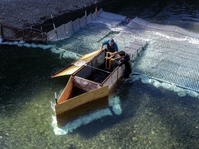 Gabe Rossi and Keane Flynn, a graduate student at the University of Nevada, Reno, examine the pikeminnow weir.