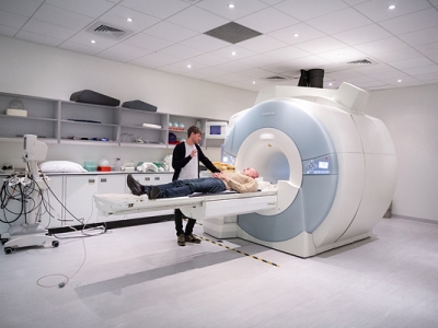 image of someone going into an MRI 