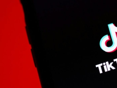 TikTok app in front of Chinese flag