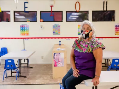 Beatriz Leyva-Cutler, executive director for BAHIA Inc. sits for a portrait in an empty classroom at Centro Vida Child Care Center, a part of the Bay Area Hispano Institute for Advancement